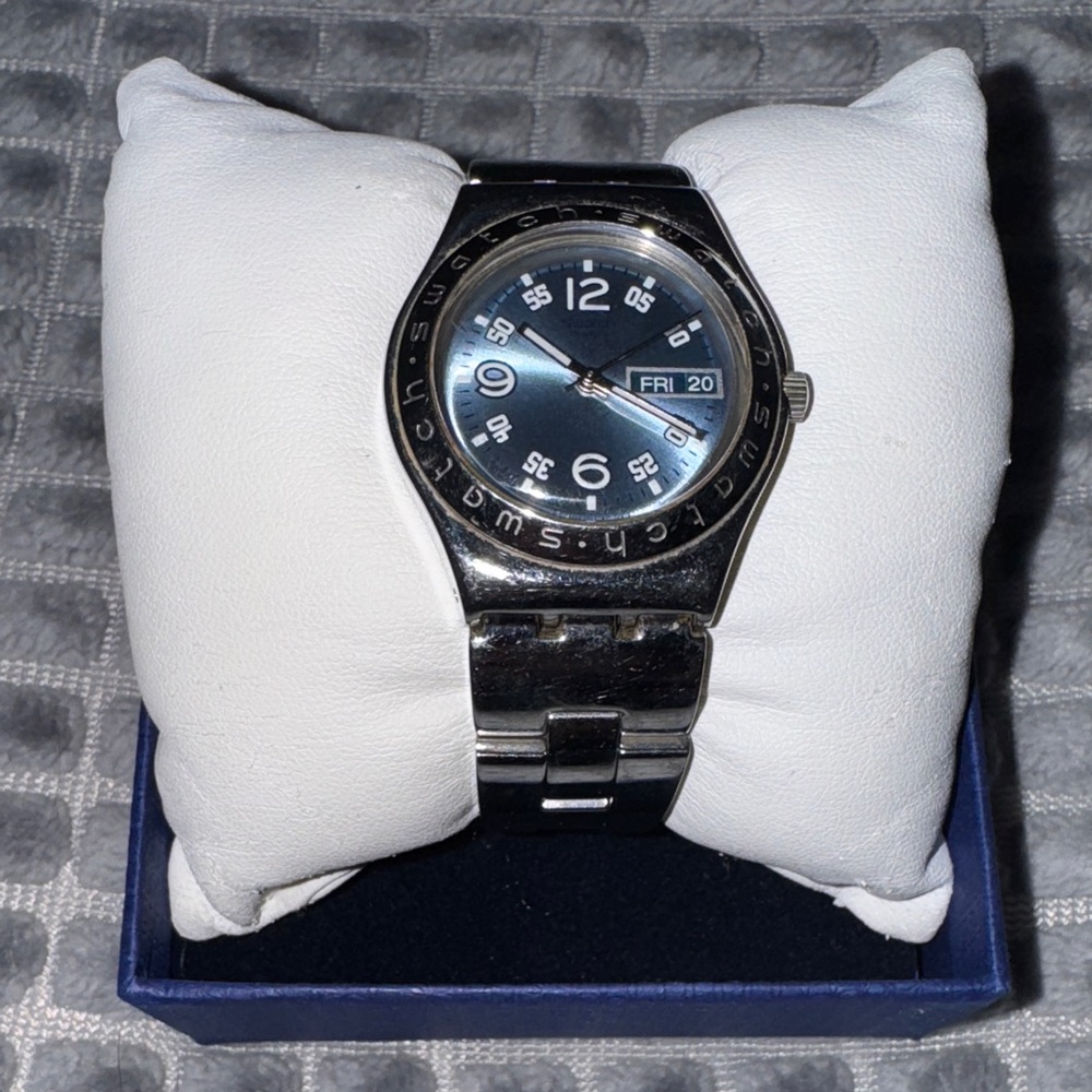 Swatch Irony light blue and Metallic Silver.